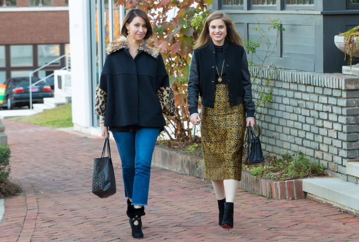 two white women with brown hair in fall outfits